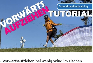 Zeigt einen Gleitschrimflieger beim Start